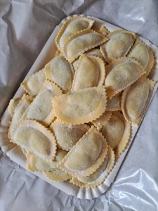 I am Sofia Lena Perissinotto, I am a blogger, content creator. In this blog post I write about Celle Ligure located in Liguria, Italy. This photo depicts fresh Pansoti, a type of filled pasta originating from the Genova area.