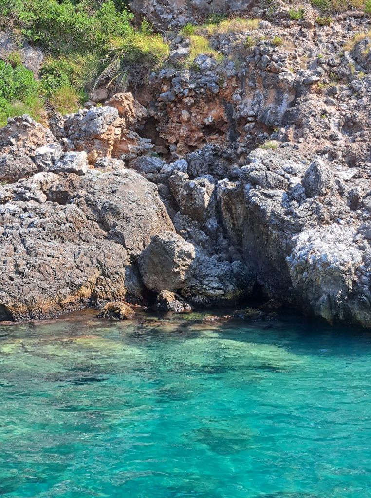 Hi, I'm Sofia Lena Perissinotto. I am a travel blogger. In this article I write about Cilento located in the Campania region of Italy. The photo is taken along the Cilento-Camerota coast.