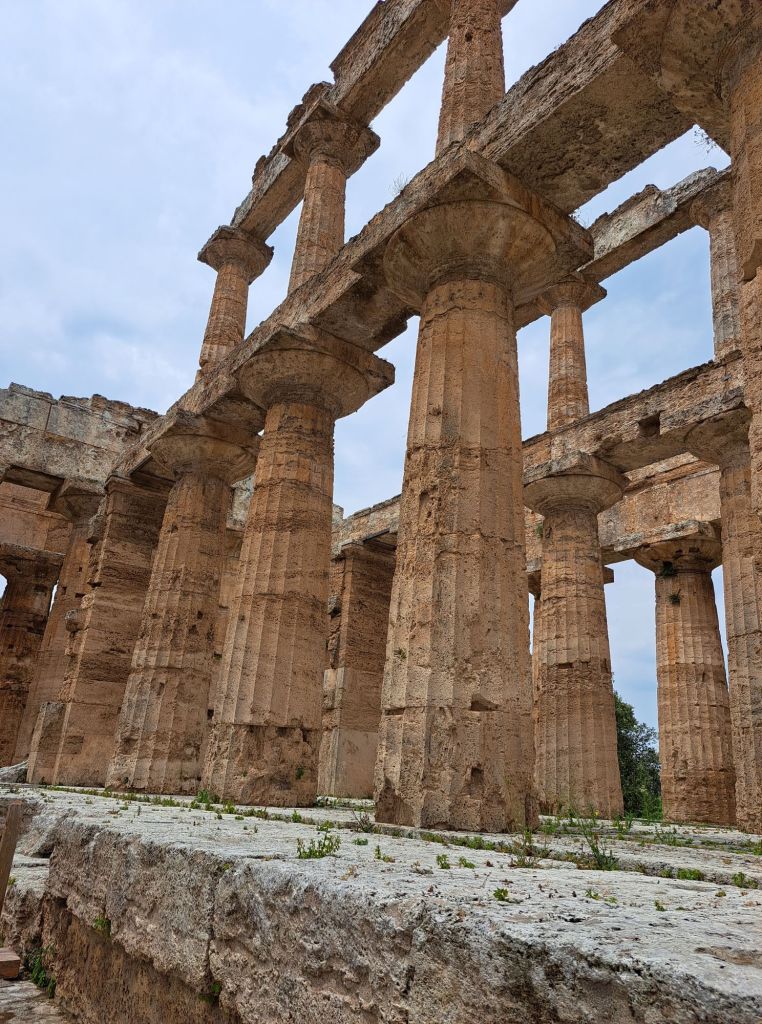 Hi, I'm Sofia Lena Perissinotto. I am a travel blogger. In this article I write about Cilento located in the Campania region of Italy.  The photo shows Paestum's archeological site!