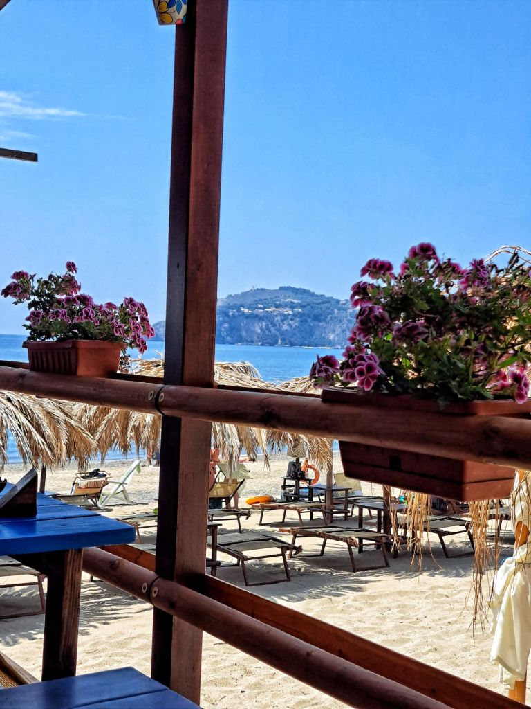 Hi, I'm Sofia Lena Perissinotto. I am a travel blogger. In this article I write about Cilento located in the Campania region of Italy. The photo shows a beach in Palinuro.