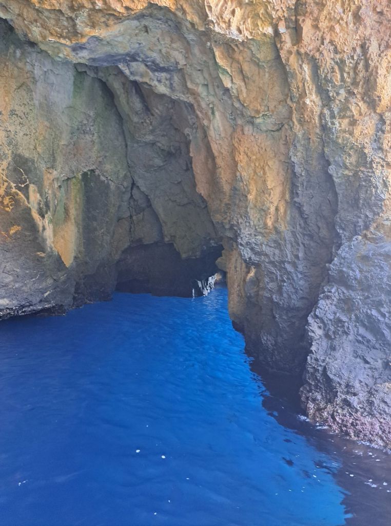 Hi, I'm Sofia Lena Perissinotto. I am a travel blogger. In this article I write about Cilento located in the Campania region of Italy. The photo shows a sea cave while exploring the Cilento-Camerota coastline.