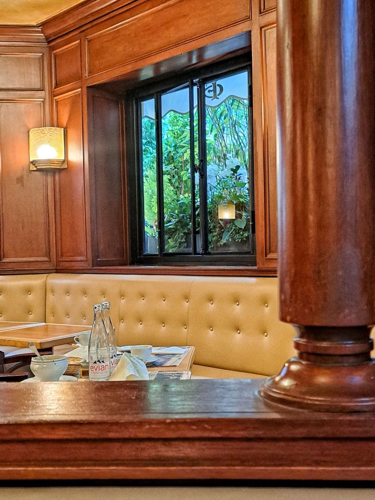 Hi, I'm Sofia Lena Perissinotto, I am a travel blogger. In this article I write about Paris, some iconic landmarks, why the city is special to me and also some café recommendations! This photo is taken inside café de Flore.