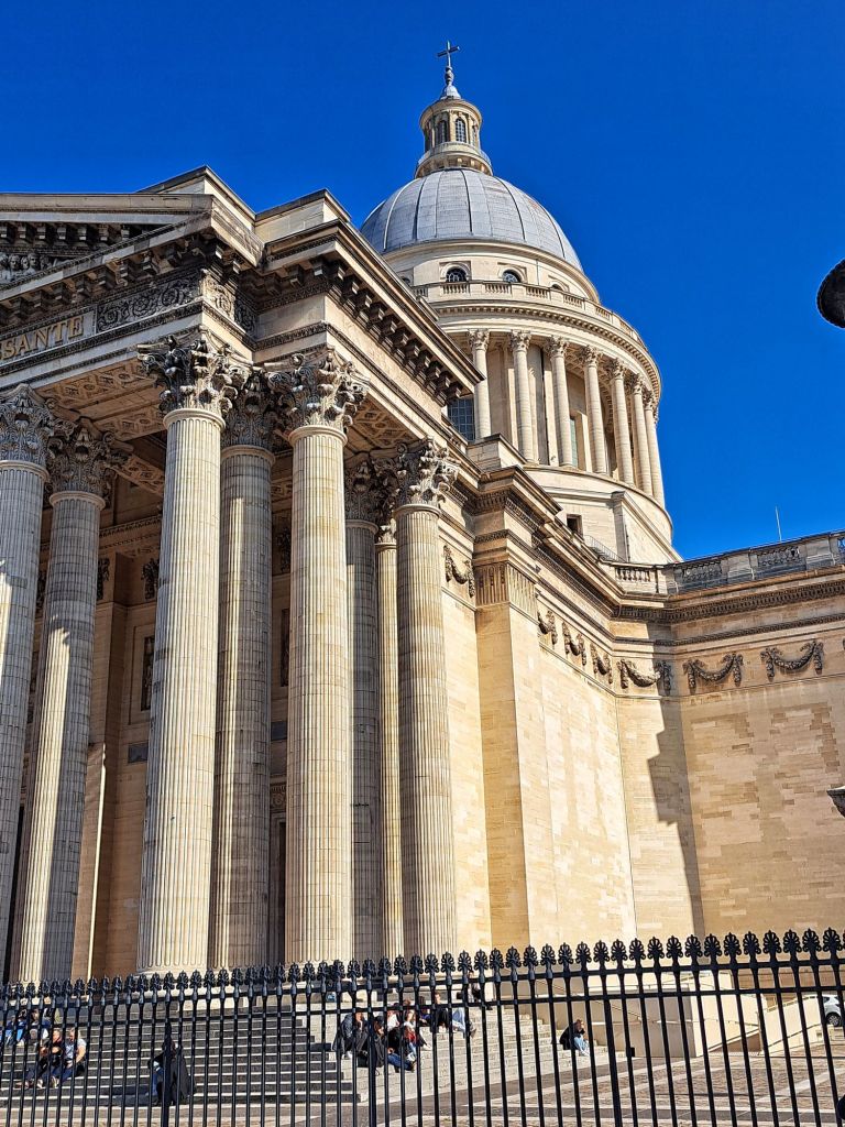 Hi, I'm Sofia Lena Perissinotto, I am a travel blogger. In this article I write about Paris, some iconic landmarks, why the city is special to me and also some café recommendations! This photo is taken at the Panthéon.