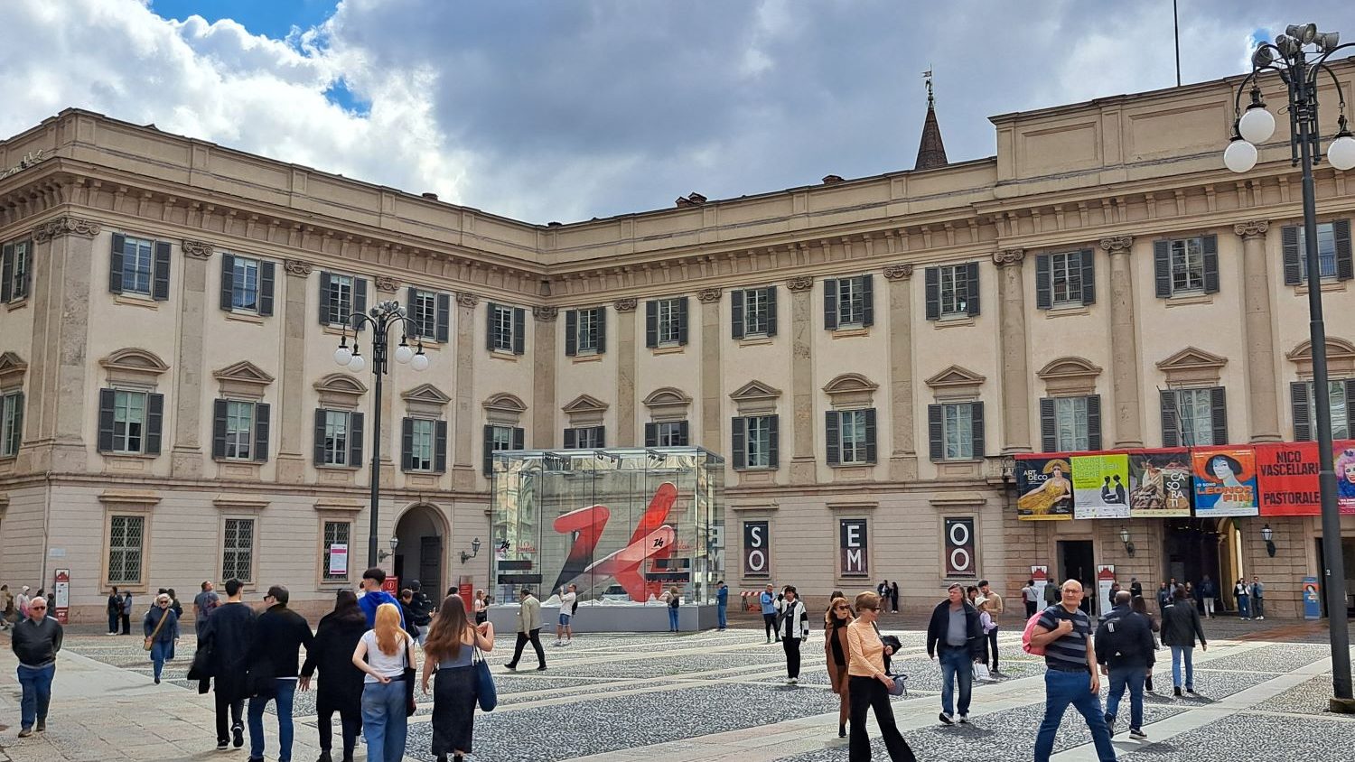 I am Sofia Lena Perissinotto, I am a blogger, content creator. In this travel article, I write about the magnificent Piazza Duomo in Milan! The photo features the historic Palazzo Reale.