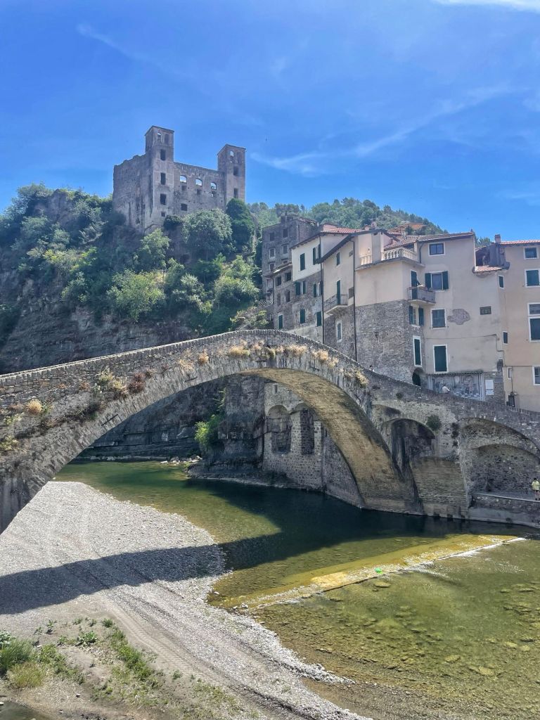In this travel article I write about Dolceacqua, a picturesque, enchanting town located in the hinterland of Liguria.